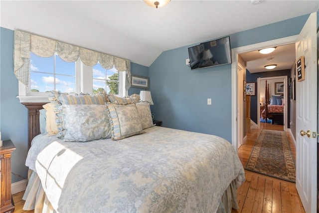 12 Windward Cir, Warwick, RI 02889 - bedroom with wood-type flooring and lofted ceiling