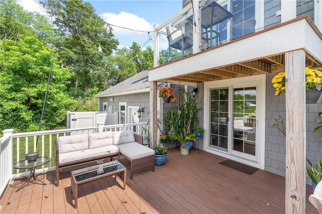 12 Windward Cir, Warwick, RI 02889 - wooden deck with an outdoor living space
