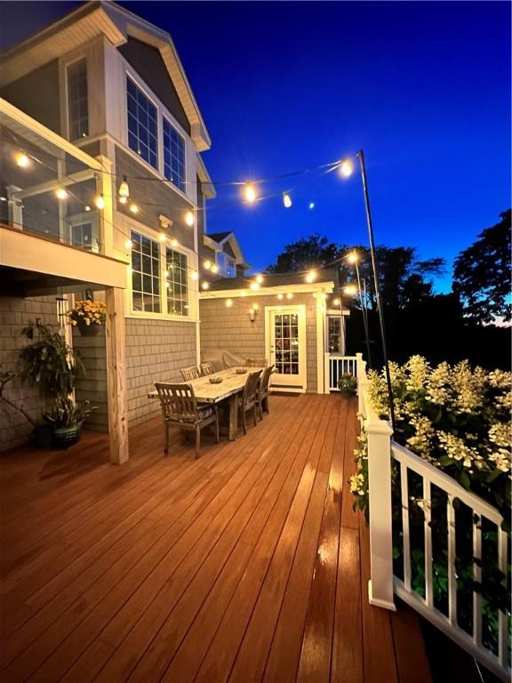 12 Windward Cir, Warwick, RI 02889 - deck at twilight featuring outdoor dining area
