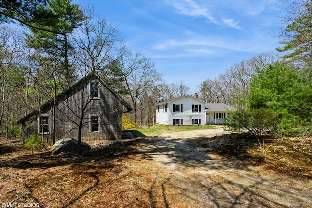 22 T Parker Rd, Foster, RI 02825 - view of front of home featuring a chimney and driveway