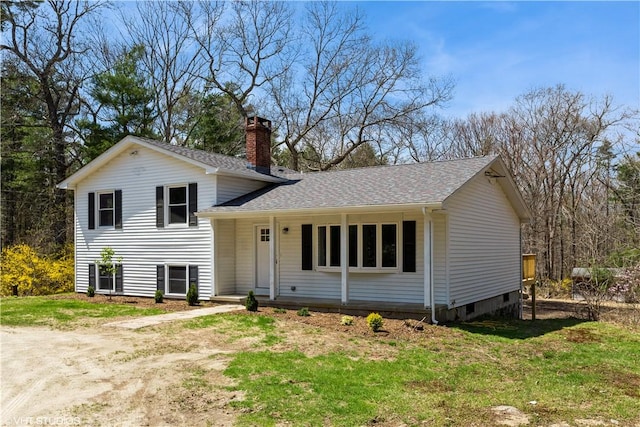 22 T Parker Rd, Foster, RI 02825 - split level home with a chimney, a shingled roof, and a front lawn