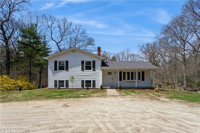 22 T Parker Rd, Foster, RI 02825 - tri-level home featuring a chimney and a shingled roof