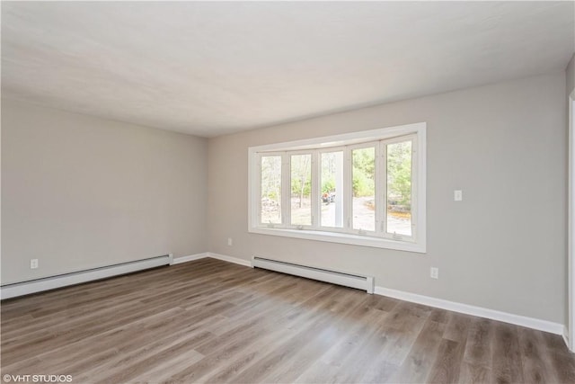 22 T Parker Rd, Foster, RI 02825 - spare room featuring baseboard heating and wood finished floors