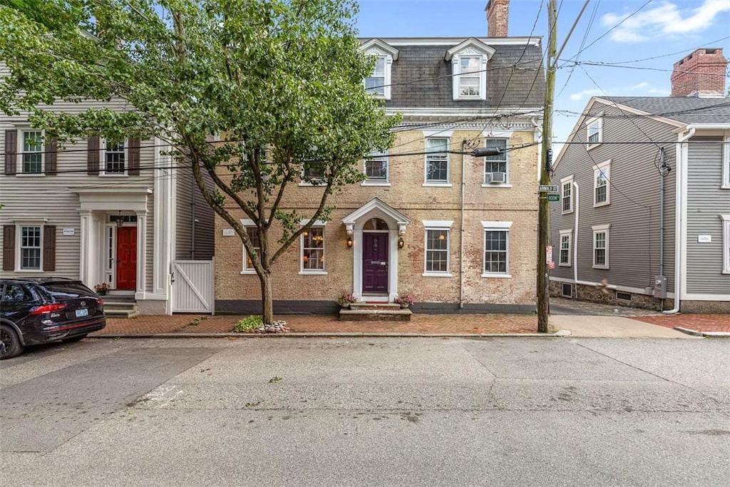 22 Arnold St, Providence, RI 02906 - view of front of house featuring mansard roof and a chimney