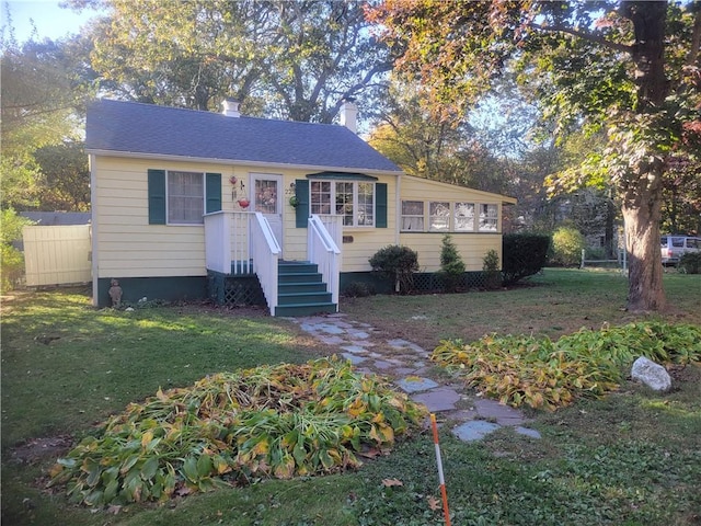 223 Mautucket Rd, South Kingstown, RI 02879 - bungalow-style house with a chimney