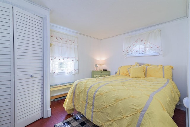 223 Mautucket Rd, South Kingstown, RI 02879 - bedroom with wood finished floors and ornamental molding