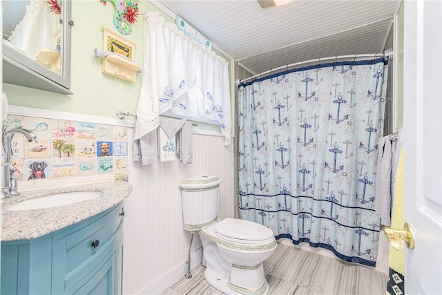 223 Mautucket Rd, South Kingstown, RI 02879 - bathroom featuring vanity, wainscoting, and a shower with shower curtain