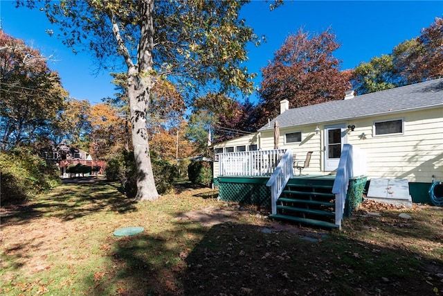 223 Mautucket Rd, South Kingstown, RI 02879 - view of green lawn with a wooden deck