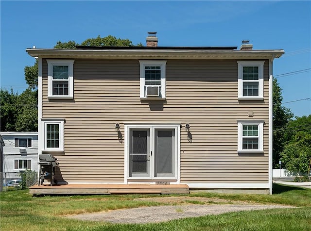 3642 Pawtucket Ave, East Providence, RI 02915 - back of property featuring a chimney, a wooden deck, and cooling unit