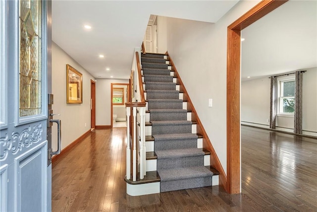 69 Apple Tree Ln, Warwick, RI 02888 - stairs featuring hardwood / wood-style floors, recessed lighting, and a baseboard radiator