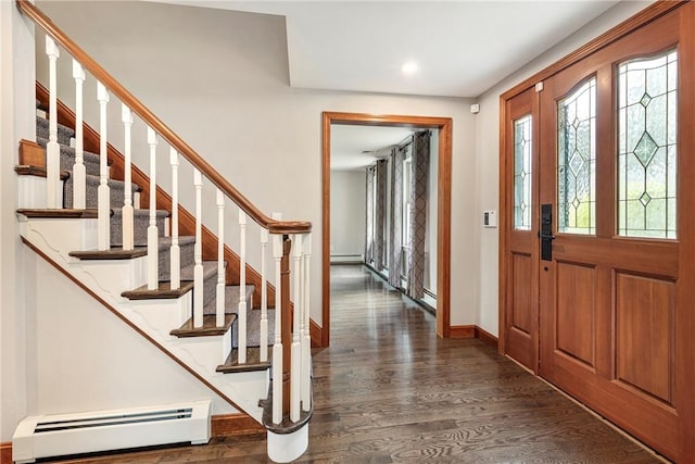 69 Apple Tree Ln, Warwick, RI 02888 - entrance foyer featuring a baseboard radiator, dark wood finished floors, stairway, and recessed lighting