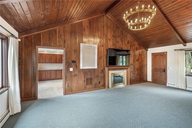 69 Apple Tree Ln, Warwick, RI 02888 - unfurnished living room with wood walls, a chandelier, wooden ceiling, carpet floors, and a glass covered fireplace