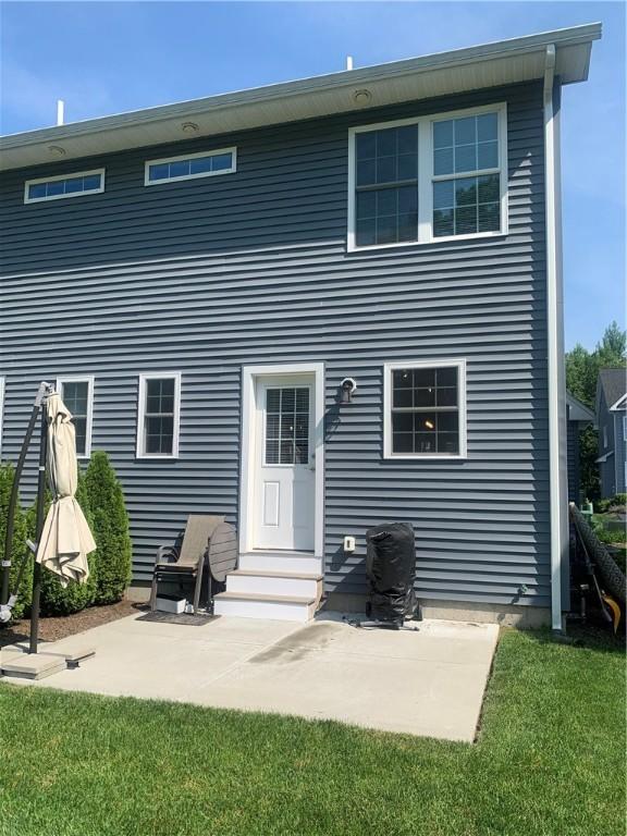 20 Winston Way, Johnston, RI 02919 - rear view of property with entry steps and a patio