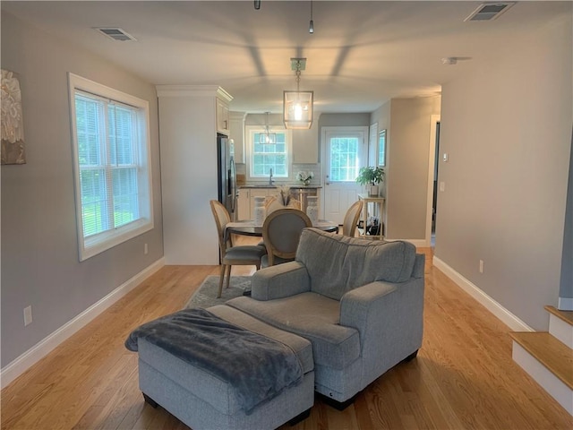 20 Winston Way, Johnston, RI 02919 - living room with light wood-style floors and baseboards
