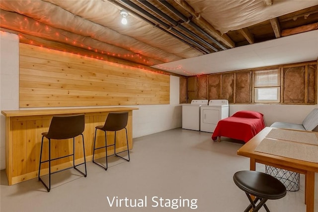 151 Willet Ave Unit 5, East Providence, RI 02915 - additional living space with washer and clothes dryer, finished concrete floors, and wood walls