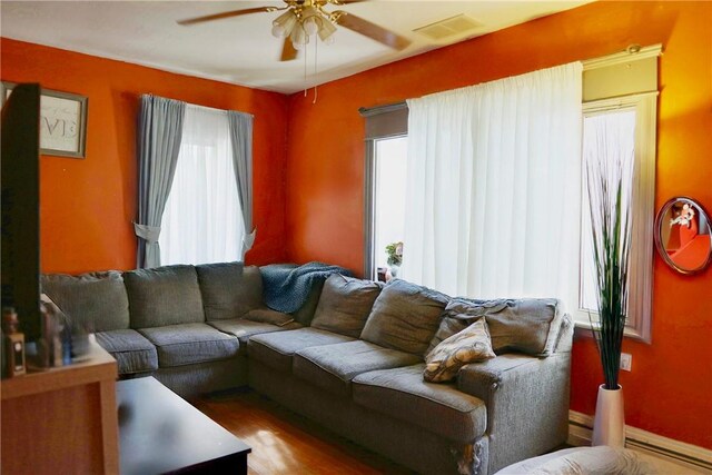 23 Majestic Ave, Warwick, RI 02888 - living room with a ceiling fan, plenty of natural light, and wood finished floors
