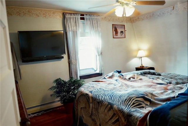 23 Majestic Ave, Warwick, RI 02888 - bedroom with baseboard heating, wood finished floors, and a ceiling fan