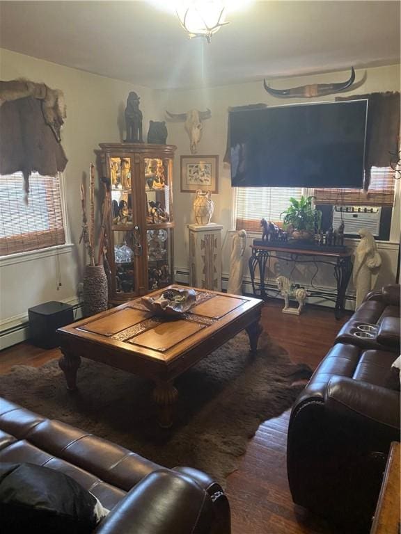 26 Anchor St, Providence, RI 02908 - living area with wood finished floors and a baseboard radiator