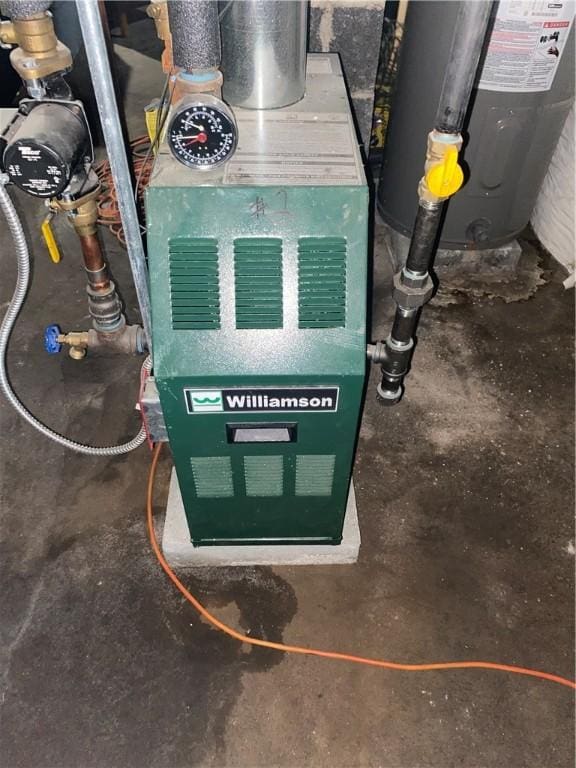 26 Anchor St, Providence, RI 02908 - utilities with gas water heater and a heating unit