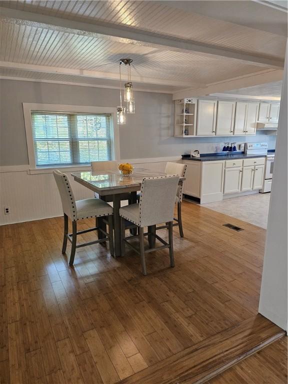 41 Park Ln, Coventry, RI 02816 - dining room featuring wainscoting and light wood-style floors