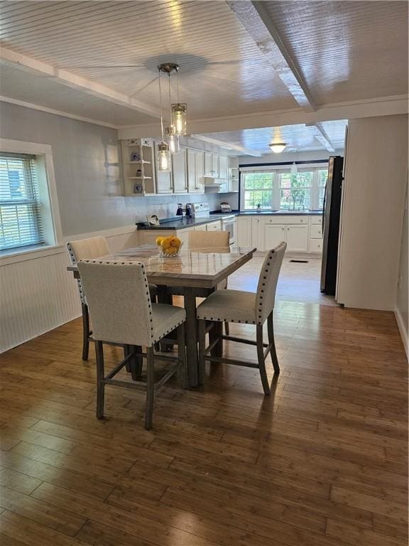 41 Park Ln, Coventry, RI 02816 - dining room featuring a wainscoted wall and dark wood-type flooring
