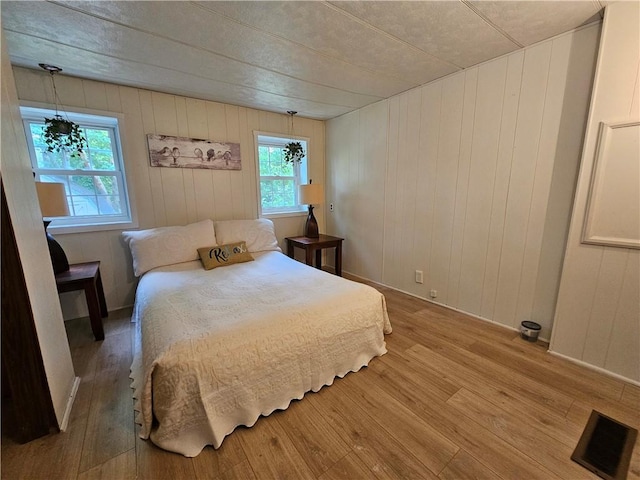 41 Park Ln, Coventry, RI 02816 - bedroom with wood finished floors and wooden walls