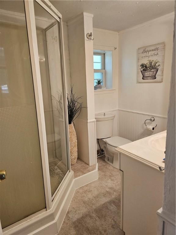 41 Park Ln, Coventry, RI 02816 - full bath featuring vanity, a stall shower, wainscoting, and ornamental molding