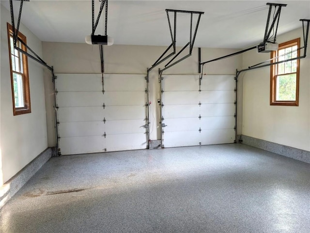 56 Ocean Ridge Dr, Charlestown, RI 02813 - garage featuring a garage door opener