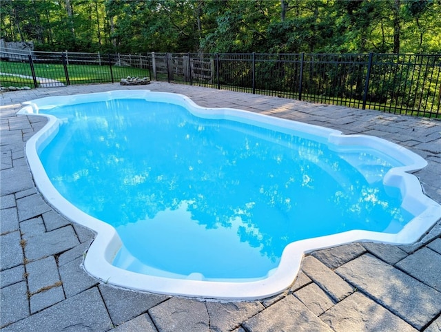 56 Ocean Ridge Dr, Charlestown, RI 02813 - view of swimming pool featuring a patio
