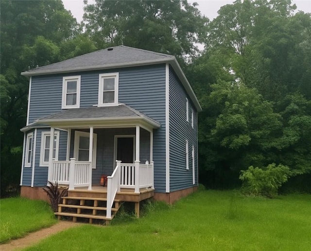 40 E Greenwich Ave, West Warwick, RI 02893 - american foursquare style home with covered porch and a front yard