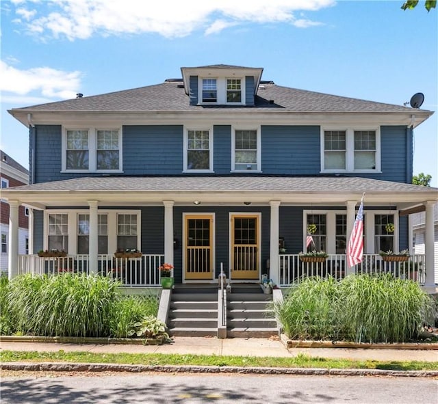32 Thurston Ave Unit A, Newport, RI 02840 - american foursquare style home with covered porch and a shingled roof
