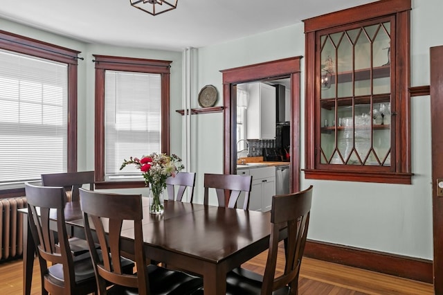 32 Thurston Ave Unit A, Newport, RI 02840 - dining room with light wood-type flooring and baseboards