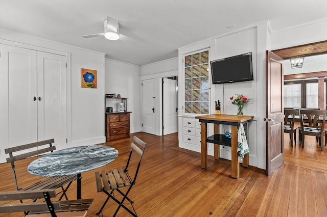 32 Thurston Ave Unit A, Newport, RI 02840 - dining space featuring crown molding, light wood finished floors, and a ceiling fan