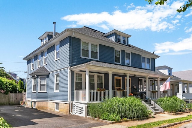 32 Thurston Ave Unit A, Newport, RI 02840 - american foursquare style home featuring a porch and a shingled roof