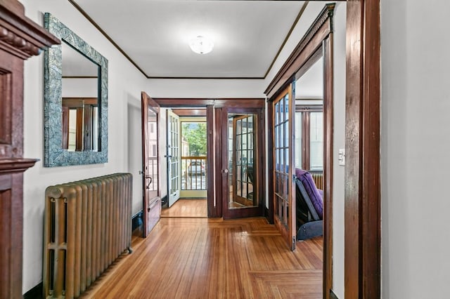 32 Thurston Ave Unit A, Newport, RI 02840 - foyer featuring radiator heating unit, french doors, and ornamental molding