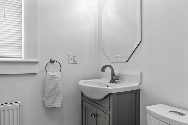 32 Thurston Ave Unit A, Newport, RI 02840 - half bathroom with vanity and radiator heating unit