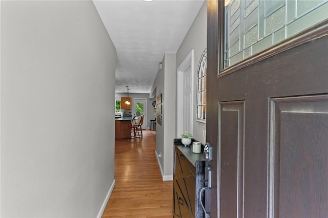 8 Anthony Rd, Foster, RI 02825 - hallway featuring light wood-style floors and baseboards