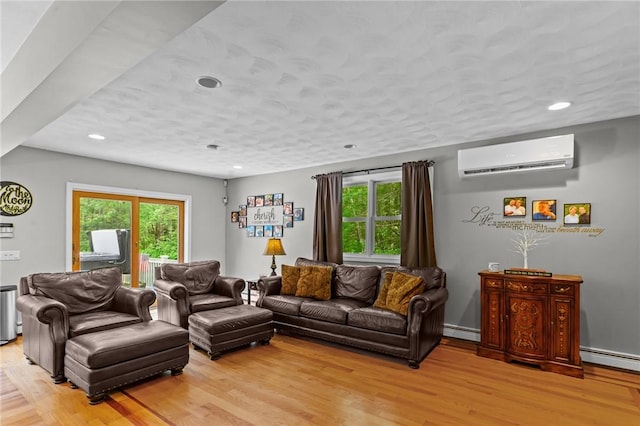 8 Anthony Rd, Foster, RI 02825 - living room featuring a wall unit AC, a baseboard heating unit, healthy amount of natural light, recessed lighting, and light wood-style floors