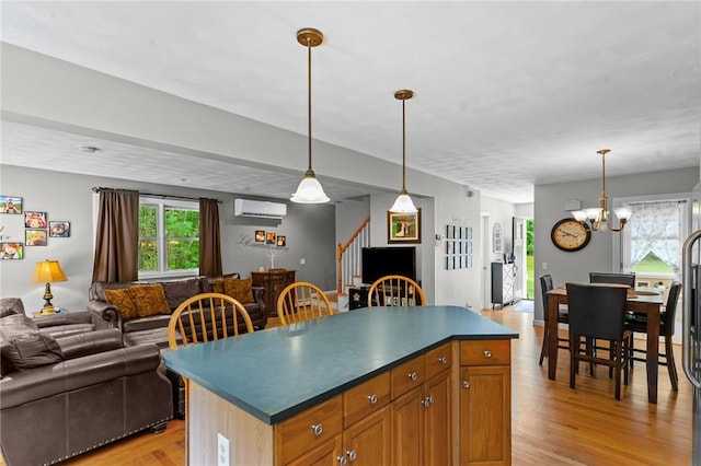 8 Anthony Rd, Foster, RI 02825 - kitchen featuring open floor plan, light wood-type flooring, dark countertops, and healthy amount of natural light