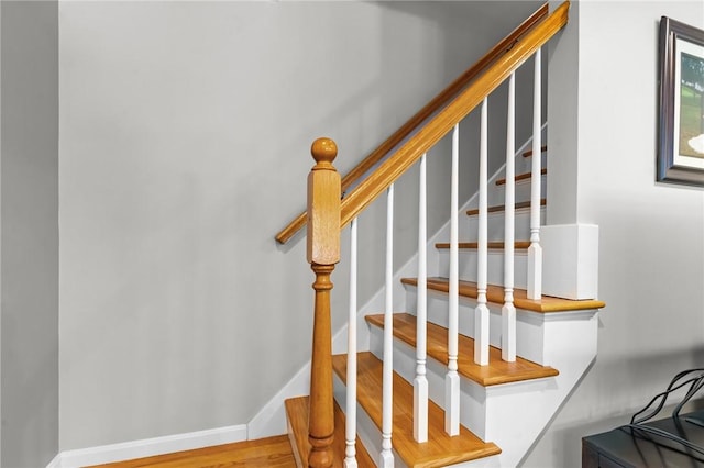 8 Anthony Rd, Foster, RI 02825 - staircase with wood finished floors and baseboards