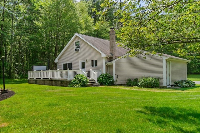 8 Anthony Rd, Foster, RI 02825 - rear view of house with a deck, a yard, and a chimney