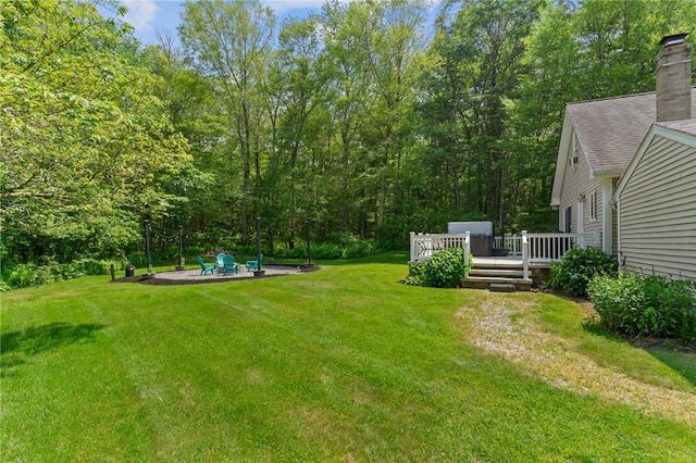 8 Anthony Rd, Foster, RI 02825 - view of green lawn featuring a patio and a deck