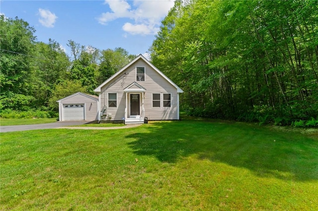 8 Anthony Rd, Foster, RI 02825 - bungalow-style house featuring an outdoor structure, a detached garage, driveway, and a front yard