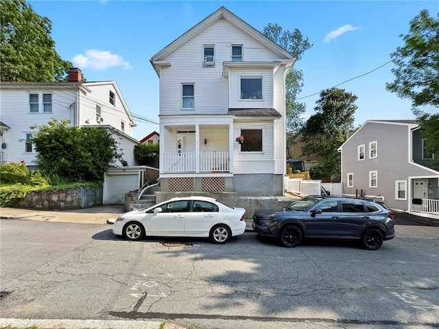 65 Lancaster St Unit 1, Providence, RI 02906 - view of front facade featuring covered porch