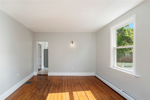 65 Lancaster St Unit 1, Providence, RI 02906 - spare room with baseboard heating and wood-type flooring