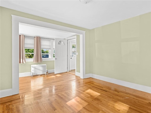 124 Everleth Ave, Warwick, RI 02888 - foyer entrance with radiator and light wood-type flooring