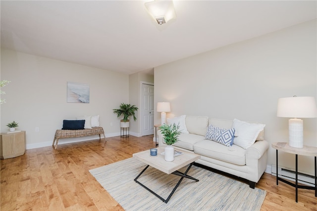 25 Bullocks Poing Ave Unit 3A, East Providence, RI 02915 - living room featuring baseboard heating and light wood-style floors