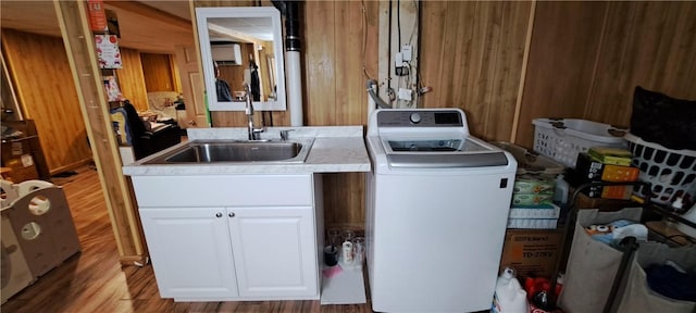 26 Morton Ave, Johnston, RI 02919 - laundry room featuring washer / clothes dryer, light wood-style floors, cabinet space, a wall mounted air conditioner, and wood walls