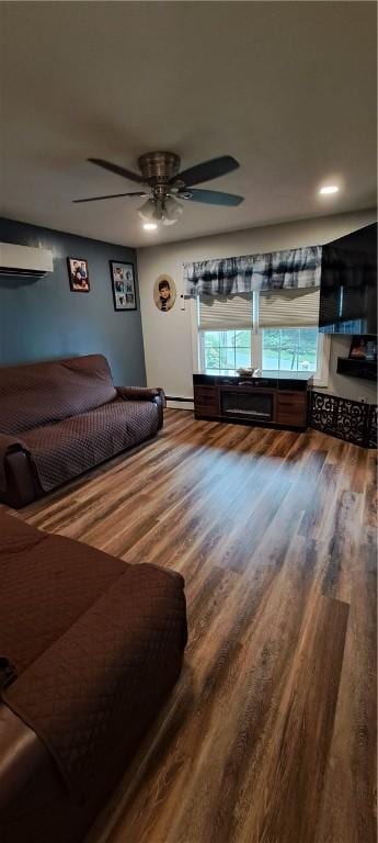 26 Morton Ave, Johnston, RI 02919 - bedroom featuring wood finished floors, a wall unit AC, and ceiling fan