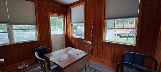 26 Morton Ave, Johnston, RI 02919 - dining area with healthy amount of natural light and wooden walls